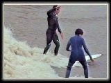 Stuart shows a travelling Chinese girl the ropes. Courtesy Jaws of the Dragon documetary.
