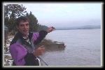 Nantes bore rider, Pierre, points the way down stream to the take-off at St Pardon, courtesy Tom Wright
